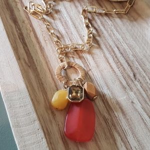 New York and Company long orange and gold necklace
